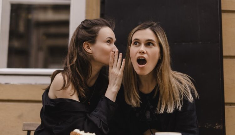 Gossiping.,Two,Beautiful,Young,Women,Gossiping,Telling,Something,On,Ear