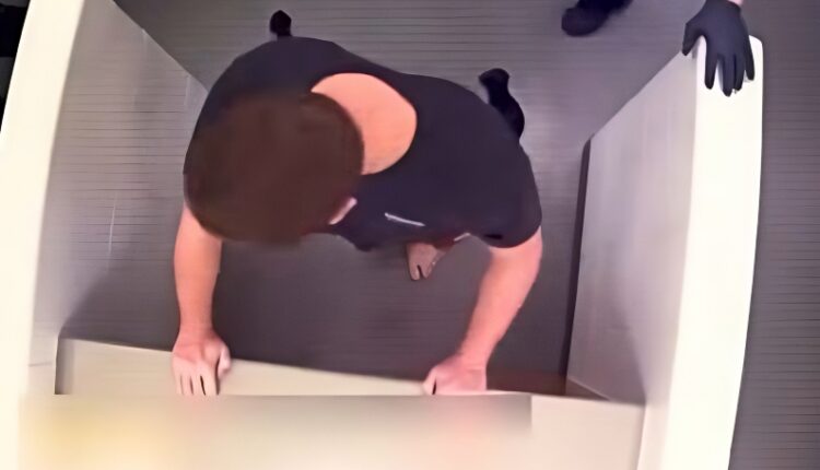 McKee being searched after his extradition – via Court TV – YouTube